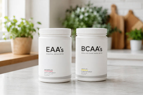 Supplement jars labeled “EAAs” and “BCAAs” sit in a bright kitchen, highlighting how EAAs and BCAAs.
